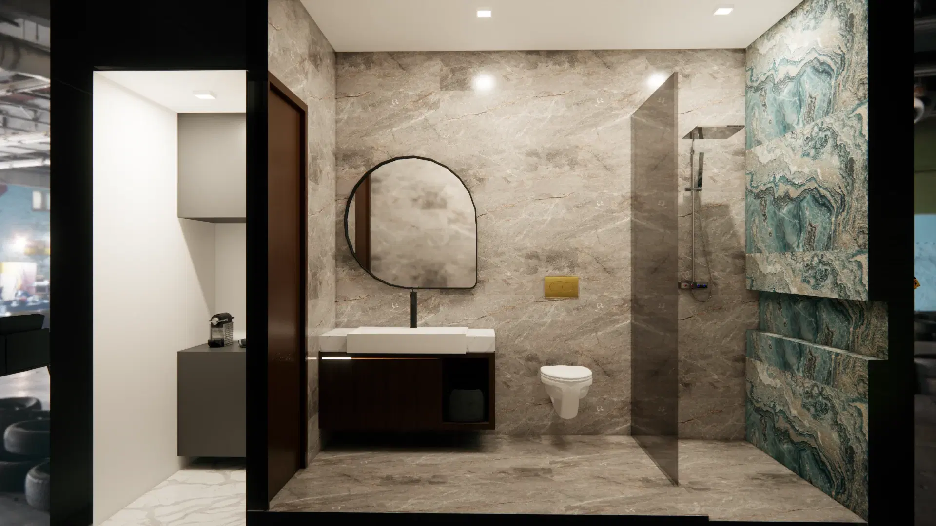 SRM Office, Madaiyur — the washroom in figured marble, a vessel basin on a floating counter below a round mirror.